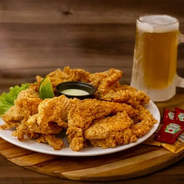 Porção tiras de frango empanado
